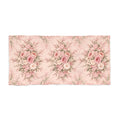 A rectangular large bath towel featuring a repeating vintage floral bouquet pattern in shades of pink, cream, and muted green on a pale pink background.